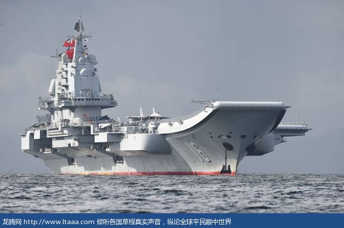 China's first aircraft carrier sailed into Hong Kong waters today its latest show of growing military might at a time of rising regional tension