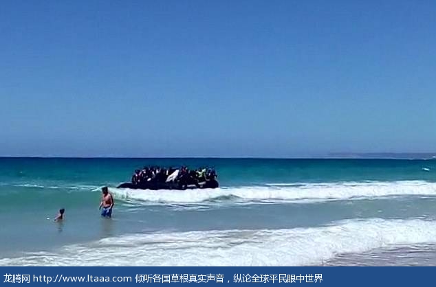 New arrivals: A video filmed by a witness show the dinghy pulling into shallow water at Cadiz