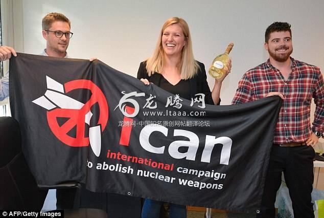 Nuclear disarmament group ICAN coordinator Daniel Hogstan executive director Beatrice Fihn (centre) and her husband Will Fihn Ramsay after ICAN won the Nobel Peace Prize for its decade-long campaign to rid the world of the atomic bomb