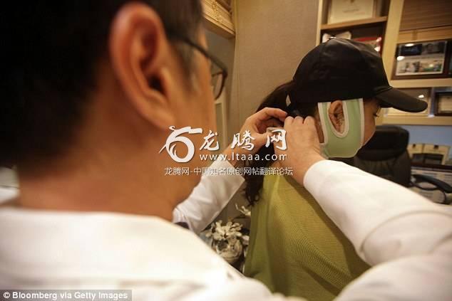 It's said that 99000 Chinese tourists went to South Korea to undergo plastic surgery in 2016. In the file photo a plastic surgeon checks a patient's post-operation condition in a consultation room at the clinic in Seoul South Korea