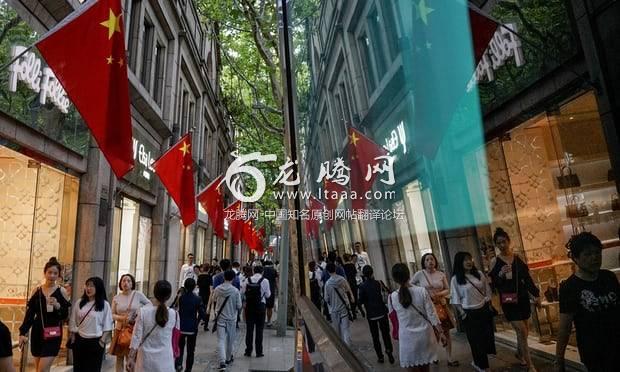 Shoppers on the streets of Shanghai.