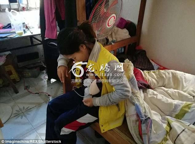 Ms Tang also sells her breast milk in bags to passersby in Shenzhen. The woman a migrant worker is pictured pumping breast milk at her tiny ￡79-per-month rental flat