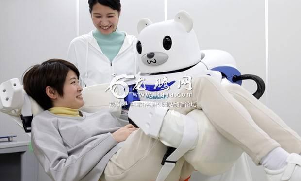 A robot “Robear” lifting a woman for a demonstration in Nagoya, central Japan. The robot can transfer frail patients from a wheelchair to a bed or a bath. 