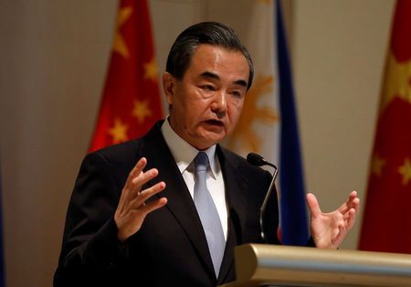 China's FM Wang Yi speaks during a joint news conference with his Philippine counterpart Foreign Affairs secretary Alan Peter Cayetano in Taguig