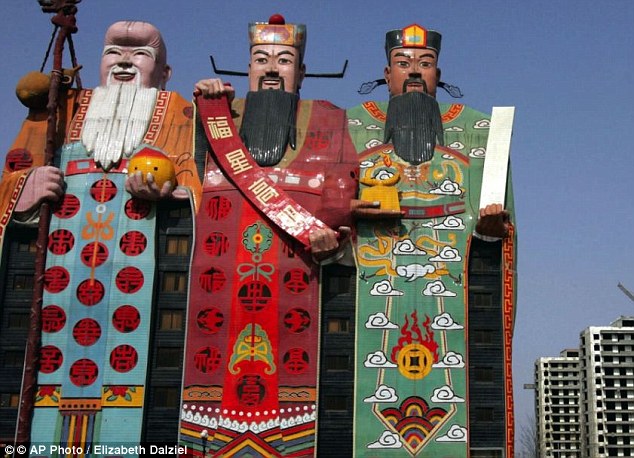 Strange structure: The Tianzi Hotel in Hebei province features the gods of fortune, prosperity and longjevity