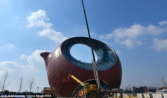 The teapot-shaped, about 130 feet tall, is part of the Wuxi Wanda Cultural Tourism City Project in east China