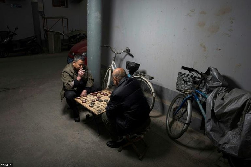 Residents of Beijing's ancient hutong alleys form a tight-knit community. Uncles and aunties would chit-chat show off their pets and play chess outside their house in the cluttered lanes