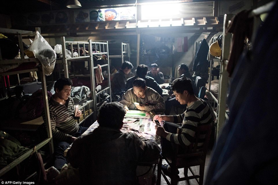 Many hutong buildings have also been turned into dormitories to accommodate migrant factory workers. These dorm rooms can be extremely packed with up to 60 workers sharing the same bedroom (pictured)