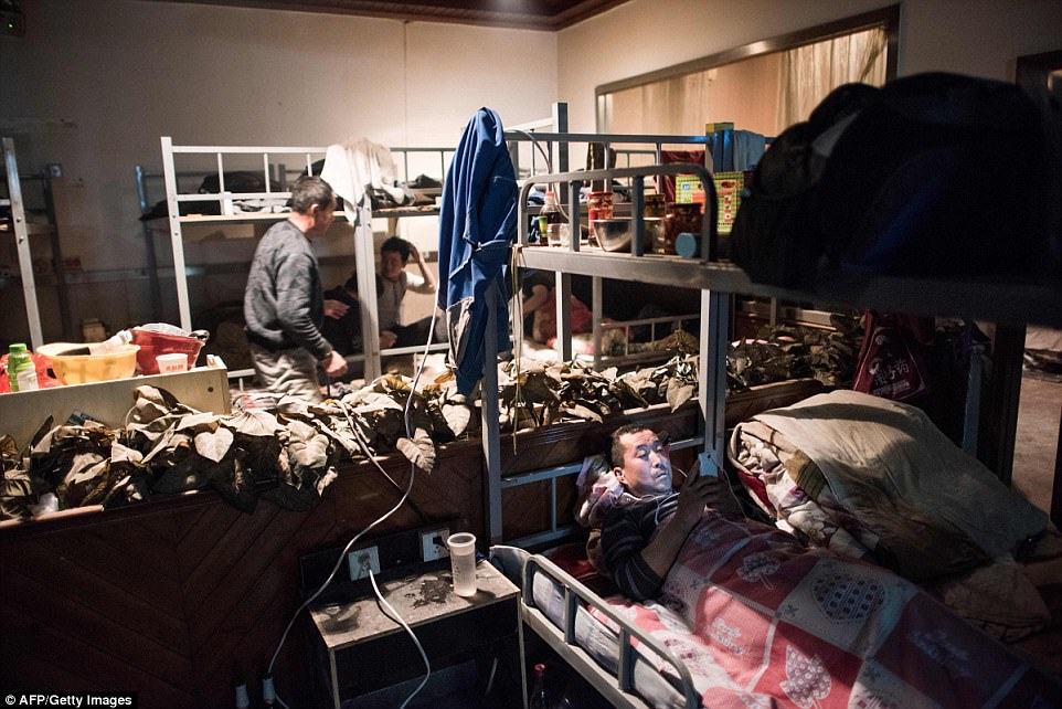 'There is no privacy here everyone sees your comings and goings and overhears your conversations' said Luo Pu a young man living in an alley near Beijing's historic Drum Tower area