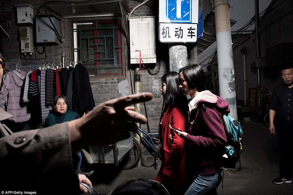 Young and old modern and traditional happiness and frustration intertwine in these small streets forming a theatrical scene of daily life in the heart of central Beijing