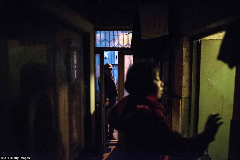 In Chinese a hutong building is known as 'siheyuan' which means a compound made up of rooms around the courtyard