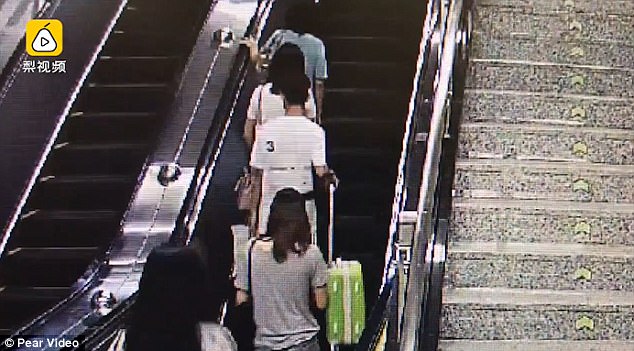 The pair were riding on the escalator when he suddenly grabbed her buttocks