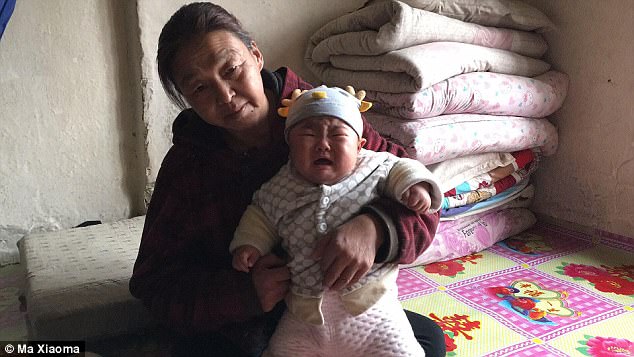 The couple live with their children and Mr Wang's mother in Hulunbuir, Inner Mongolia