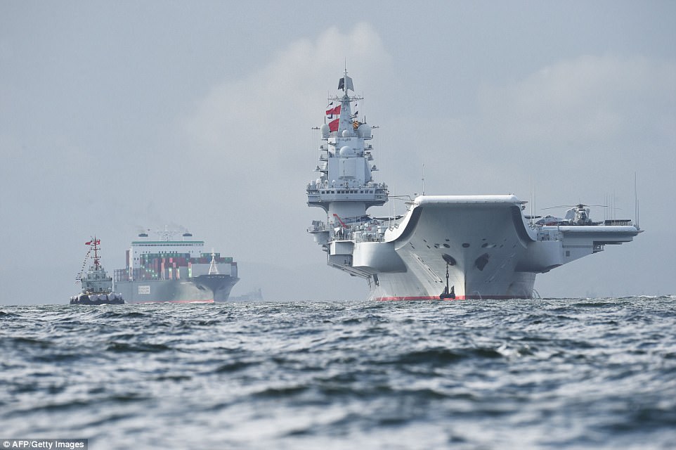 Anchoring off Lantau island in the harbour's outer reaches the carrier was flanked by a protective cordon of marine police craft and a locally-based Chinese navy corvette