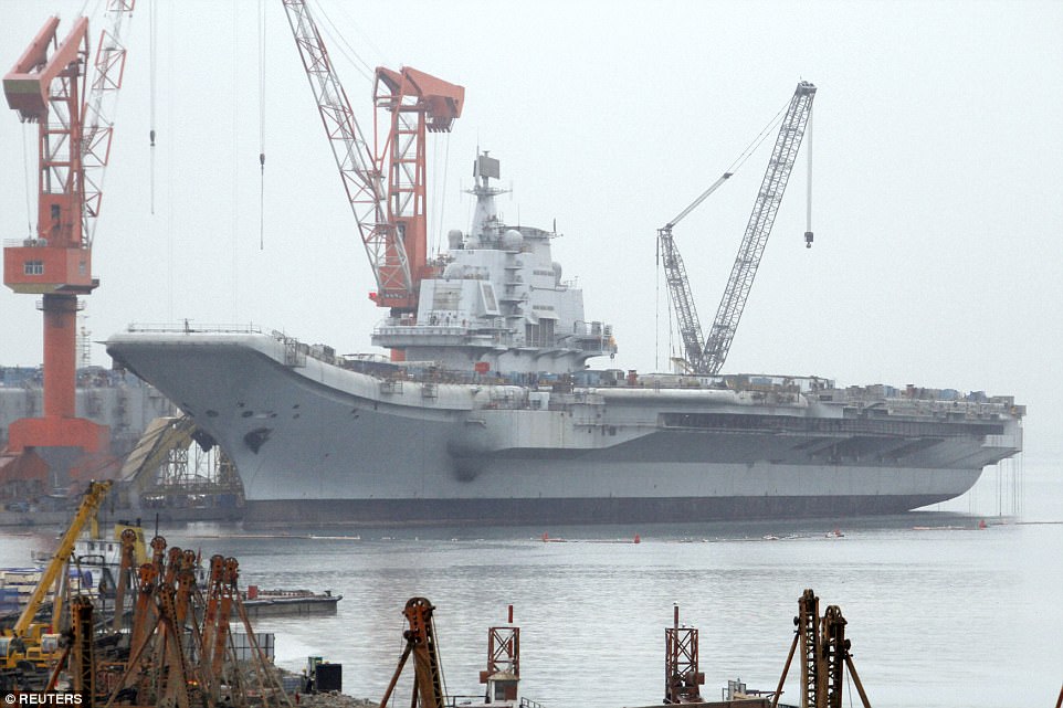 China bought the ship in the 1990s when it was called Varyag. It is pictured above at a port in Dalian Liaoning province in 2011