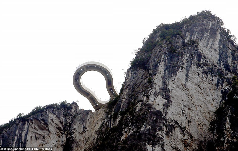 The walkway in Chongqing extends 87.5ft from a cliff edge allowing visitors to feel as though they are walking on air