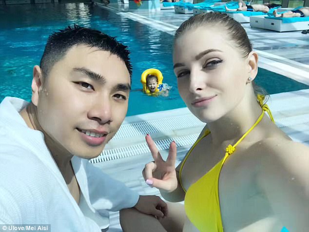Mei Aisi his wife and their daughter are on holiday. Mr Mei became famous in China after sharing pictures of his Ukrainian wife. People in China were amazed by his pretty partner