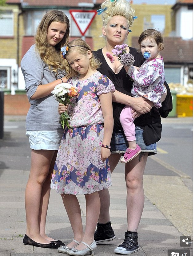 The mother-of-four pictured with daughters (from left) Ella 15 Issy 11 and Amelia four said she is concerned about the impact bullies and social media have on youngsters when it comes to body shaming