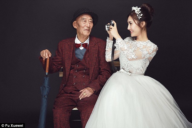 The 87-year-old grandfather Fu Qiquan smiles as he looks at his grand-daughter in the eyes