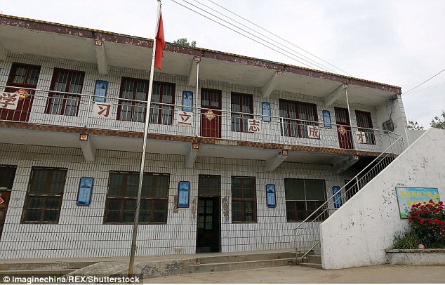 Youcheng Primary School pictured is now abandoned and left with one teacher and one pupil