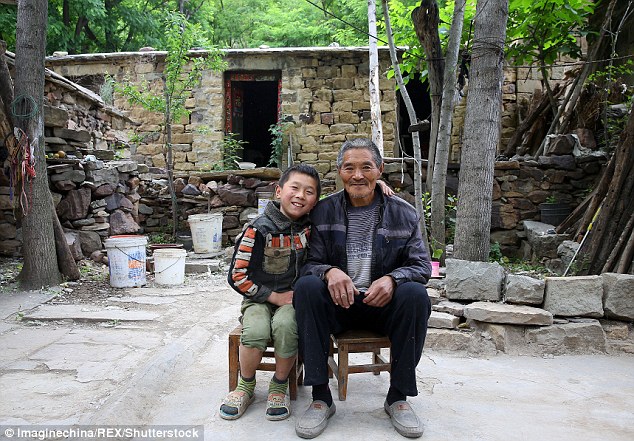 Jiaqi is brought up by his grandfather pictured in a village in Taihang mountain