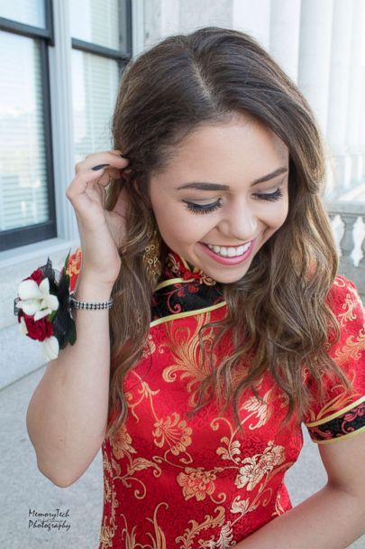 PHOTO: Keziah Daum, an 18-year-old senior at Woods Cross High School, Utah, received immediate backlash after she posted photos of her dressed in a red qipao, a traditional Chinese dress, on prom night. (Michael Techmeyer)