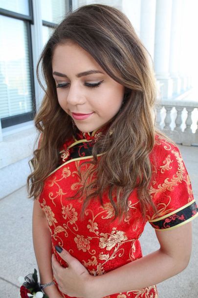 PHOTO: Keziah Daum, an 18-year-old senior at Woods Cross High School, Utah, is pictured in a red qipao, a traditional Chinese dress, on prom night. (Michael Techmeyer)