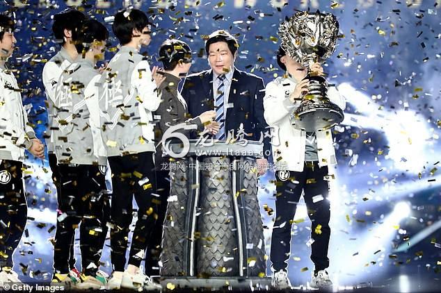 Wang Sicong's team Invictus Gaming celebrates their winning after the final match of the 2018 League of Legends World Championship in Incheon South Korea on Saturday