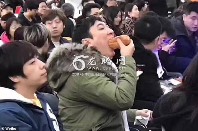 Picture of Wang Sicong stuffing a hot dog into his mouth has gone viral on China's on Twitter-like Weibo and Whatsapp-like WeChat. The picture was taken at a League of Legends event